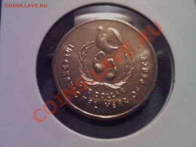 ГОД МИРА 1 доллар АВСТРАЛИЯ 1986г. UNC до 19.01 в 22.00 - 12012013(013)