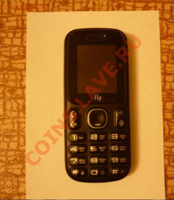 Телефон Fly DS113 на монеты (!) - 1.JPG