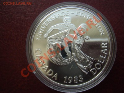 Канада Ag-500 1$ 1983 ПРУФ Универсиада в капсуле до 22.04 22 - Канада доллар 1983 универсиада-1.JPG
