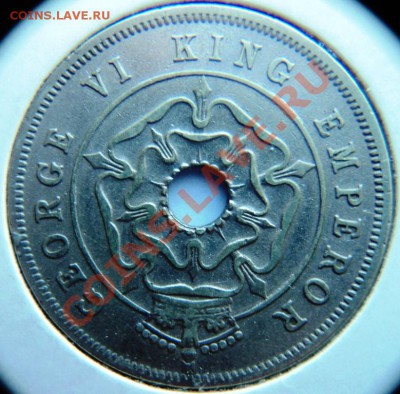 южная родезия 1 пенни 1937,39,40,42 гг - DSC06981.JPG
