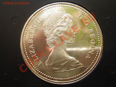 Канада: Ag-500 1$ 1973 К.полиция в коробке до 24.06 22 - Канада доллар 1973-2.JPG