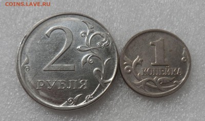 2 руб. 2012г. смещение, гладкий гурт. 1 коп. 2001м смещение  - 2