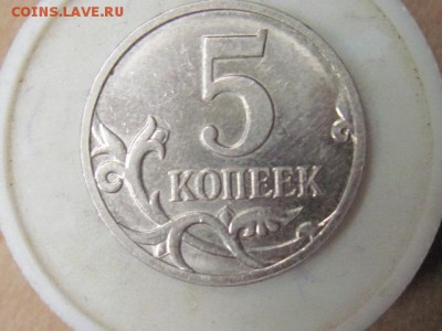 2 монеты 1к 2003г и1к 2005г помощь в определени шт. - IMG_4104.JPG