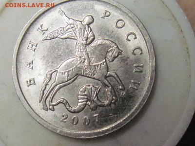 2 монеты 1к 2003г и1к 2005г помощь в определени шт. - IMG_4105.JPG