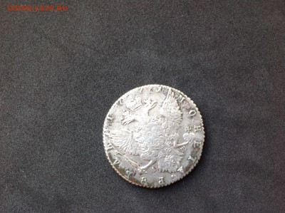 на аверсе рубля 1771 года отпечаток следа другой монеты - image