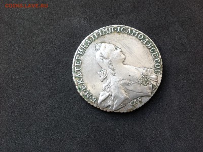 на аверсе рубля 1771 года отпечаток следа другой монеты - image