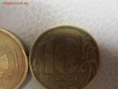 ВЫКРОШКИ ОКОЛО ЦИФРЫ 0 НА 10 РУБЛЯХ - 10г. выкрош 3.JPG