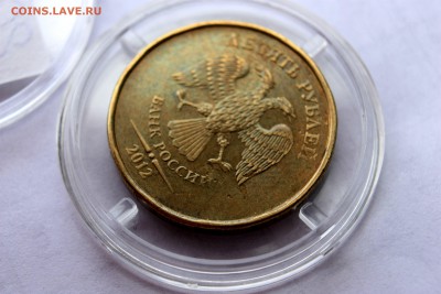 Оцените брак на 10 рублях 2012 ММД - аверс 45 градусов