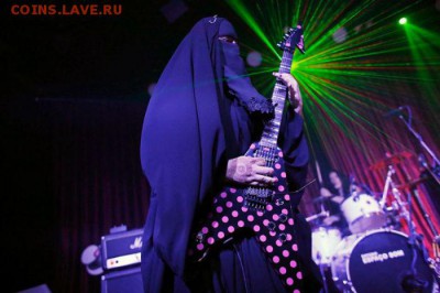 О религии.  Новости. - burqa_wearing_rock_guitarist_01