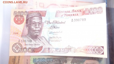 НИГЕРИЯ 100 найра 2009    UNC   до  27 го в 21-10мСК - 21.10.2015 лллл 062.JPG