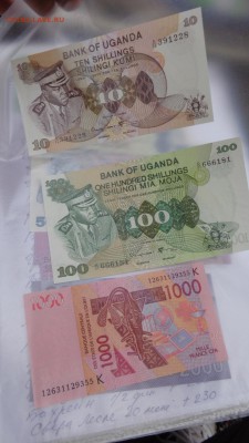 УГАНДА 10,100,Сенегал  1000  UNC до 2.Х1 в 21-20 мСК - крр 02.10.15  суу 277.JPG