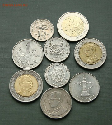 Лот иностранных монет 9 штук до 18,02,22-00 - ин3