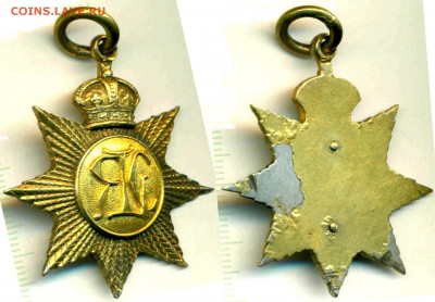 знак восьмиконечная звезда с короной и вензелем R(?)LC - Великобритания Медаль 389