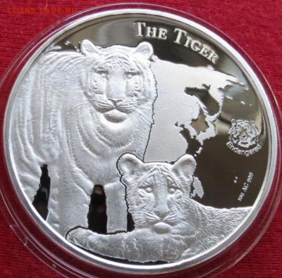 монеты с изображением тигров - НИУЭ 1 $ 2015 тигр 1.JPG