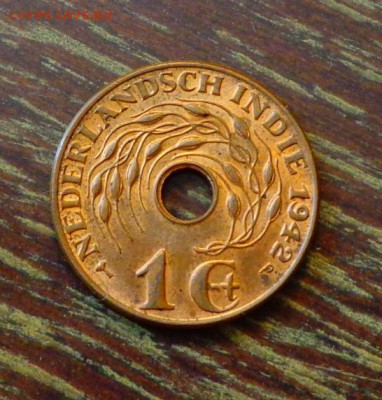 НИДЕРЛ. ИНДИЯ - 1ц1942 ТЮЛЬПАНЫ с отверстием до 15.04, 22.00 - Нидерландская Индия 1 ц 1942 с отверстием