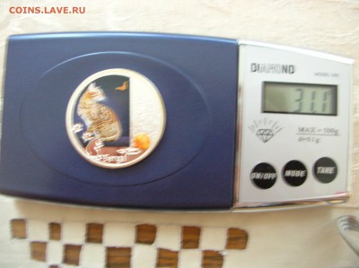 2 Доллара о-ва Нуйи " Бенгальский кот" 2012 год Ag - DSCN1377.JPG