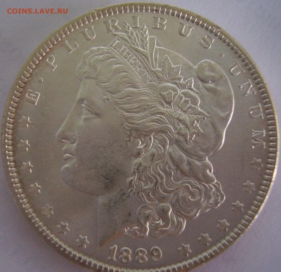 Оцените серебряную монету 1 доллар США. - 1889-1