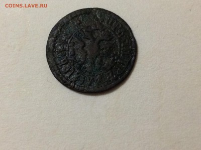 Помогите определить стоимость Петровской полушки и год - image