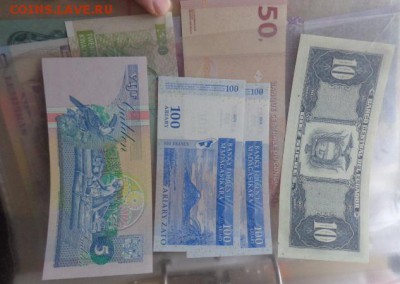 Суринам,Мадагаскар 100,Эквадор 10  UNC до 27.10  в 21-30 мск - DSC05594.JPG