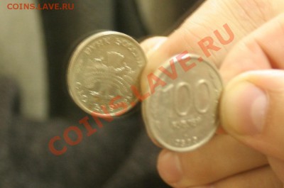 100 рублей 1993г. ЛДМ поворот орла от номинального около 170 - Монет.JPG