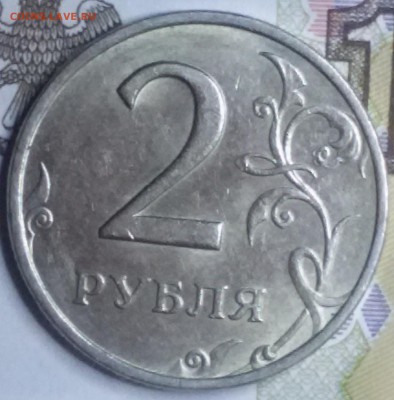 Оценить три 2-х рублёвые монеты - 1999 м р шт.блеск