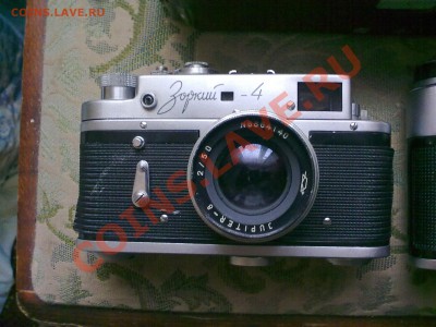 оценить 4 фотоаппарата - 26032011045