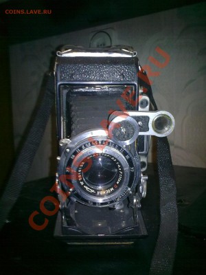 оценить 4 фотоаппарата - 26032011047