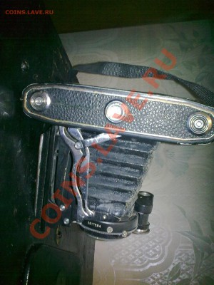 оценить 4 фотоаппарата - 26032011048