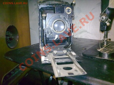 оценить 4 фотоаппарата - 26032011049