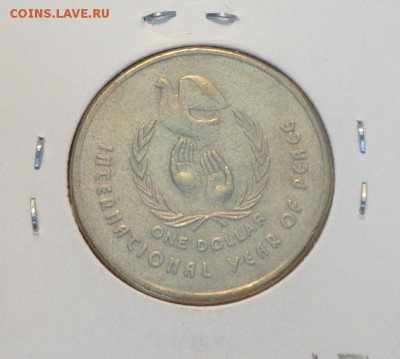 АВСТРАЛИЯ - 1д ГОД МИРА до 16.03, 22.00 - Австралия 1 доллар Год мира_2