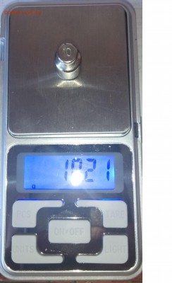 Весы Китай - на весах гирька 10 гр - cal