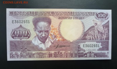 СУРИНАМ 100 гульденов 1986г, ДО 09.01. - Суринам 100 гульденов 1986г., А.(1)