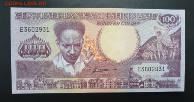СУРИНАМ 100 гульденов 1986г, ДО 28.01. - Суринам 100 гульденов 1986г., А.(1)(1)