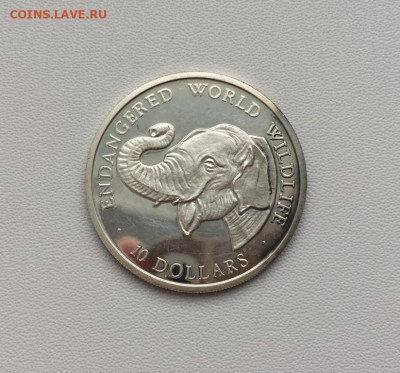 КПД Острова Кука 10$ долларов 1990 Слон серебро - kpd_ostrova_kuka_10_dollarov_1990_slon_vymirajushchie_vidy_fauna_zhivotnye_buklet_serebro