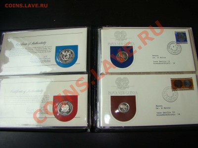 Новая Гвинея. Набор монет 1975. Серебро в футляре - DSC06993.JPG
