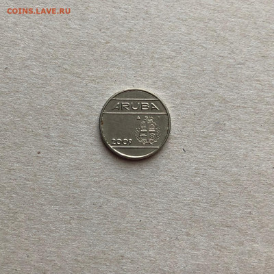 Аруба 25 центов,до 12.03. - 0AExQ0GBA_c