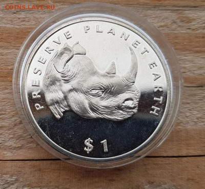 Крона Шайба Эритрея 1 доллар 1994 Носорог - krona_shajba_eritreja_1_dollar_1994_beregite_planetu_zemlja_nosorog_fauna_zhivotnye_unc