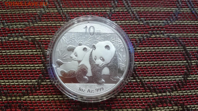 10 юаней Панда 2010 (СЕРЕБРО) - Китай - панда 2010 фон