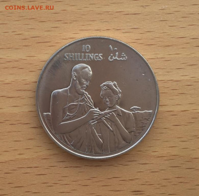 Крона Шайба Сомали 10 шиллингов 1979 10 лет революции - krona_shajba_somali_10_shillingov_1979_10_let_revoljucii_respubliki_unc_muzhchina_i_zhenshchina_lot_2