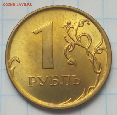 1 рубль 2014 г. предположительно  на чужой заготовке - 1 рубль на заготовке 100  песо  Колумбии-Р
