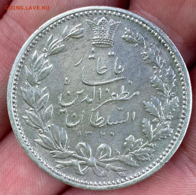 Серебренная монета - 5971296F-CC11-451A-8F24-6DB75F3AAE86