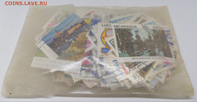 Марки  мира.300 штук.В пакетах.Фикс 200 руб - 4