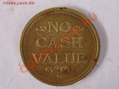 Орел и надпись No Cash Value - жетон