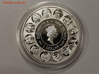 1дол 2010 Ниуэ Зодиак А.Мухи(Рыбы), серебро. Ag925, до 26.12 - Z Муха-Рыбы-2