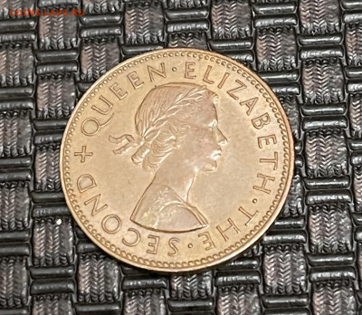 2 пенни 1960 идол Маори - 357ACDDD-C51F-42BB-A59C-DB64E639D83D