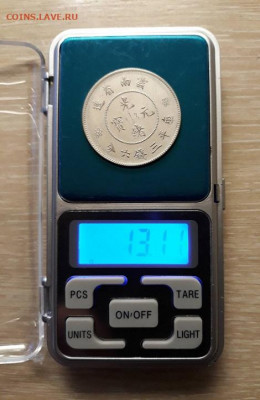 Серебрянная монета Китая - 4
