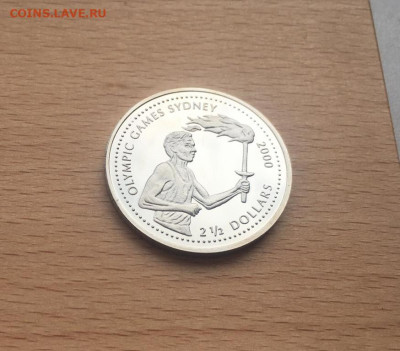 Крона Шайба Либерия 2,5$ долларов 1999 Олимпийские Игры - krona_shajba_liberija_2_5_dollarov_1999_letnie_olimpijskie_igry_sidnej_fakel_ogon_sport_olimpiada (4)