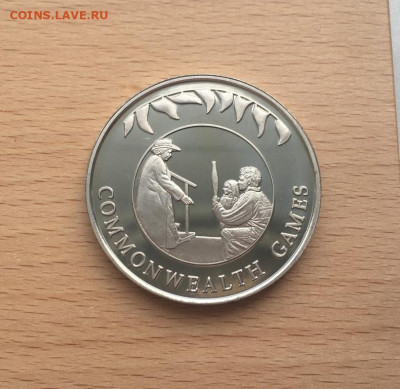 Шайба Фолклендские острова 50 пенсов 2002 Игры Содружества - krona_shajba_folklendskie_ostrova_50_pensov_2002_50_let_pravleniju_elizavety_igry_sodruzhestva_sport