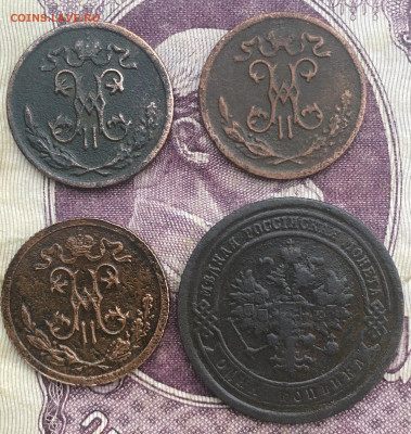 2 копейки; 1 копейка; 3 копейки; 5 копеек. - C23FCE8A-8397-4BAA-8B9D-EAC39C0691B1