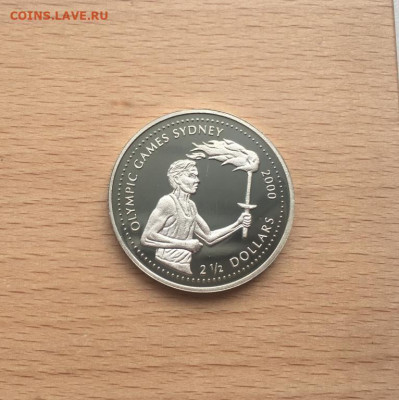 Крона Шайба Либерия 2,5$ долларов 1999 Летние Олимпийские Иг - krona_shajba_liberija_2_5_dollarov_1999_letnie_olimpijskie_igry_sidnej_fakel_ogon_sport_olimpiada